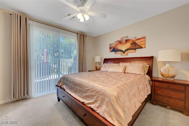 carpeted bedroom with ceiling fan and access to exterior