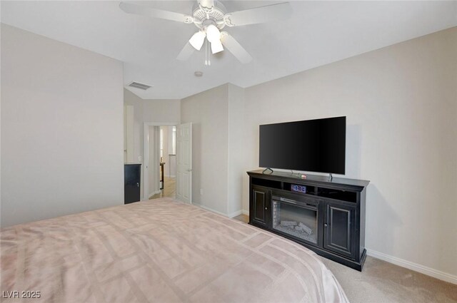 bedroom featuring ceiling fan and light colored carpet