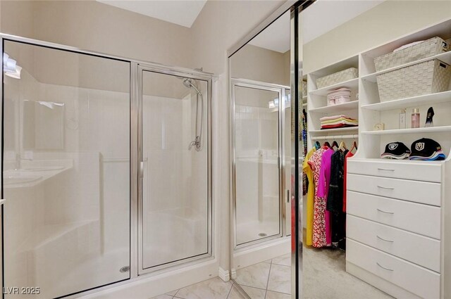 bathroom featuring an enclosed shower