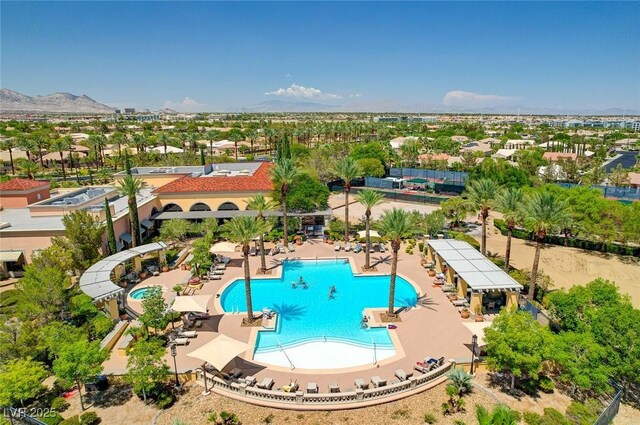 birds eye view of property featuring a mountain view