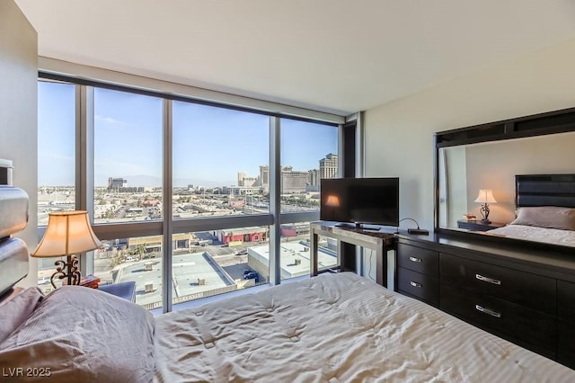 bedroom with a wall of windows