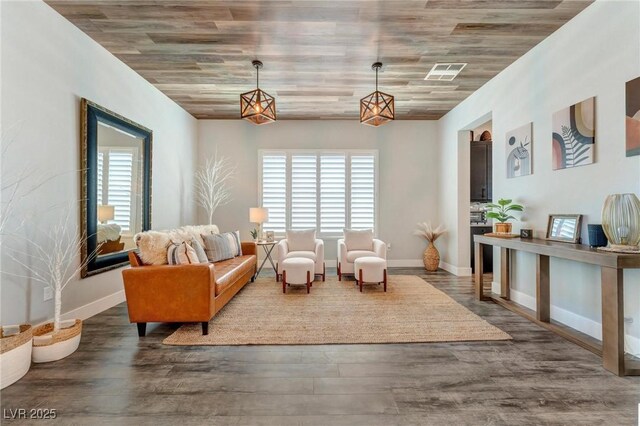 sitting room with dark hardwood / wood-style floors