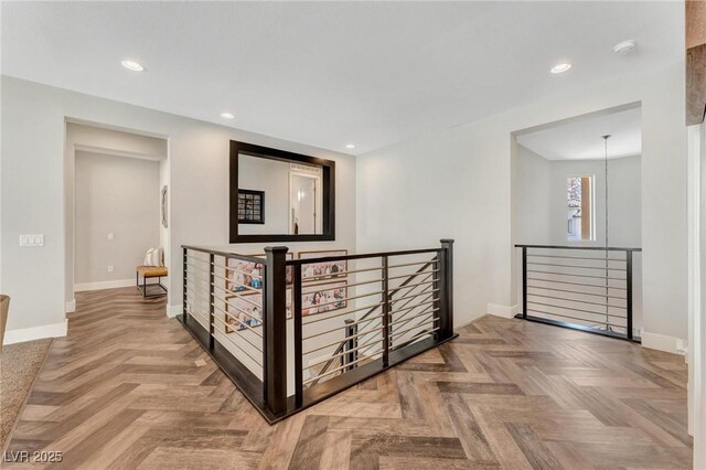 hall with parquet flooring