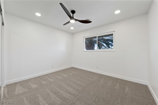 unfurnished room with carpet floors and ceiling fan