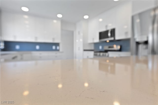 kitchen with white cabinetry