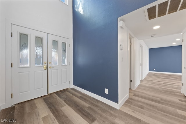 entrance foyer featuring light hardwood / wood-style flooring