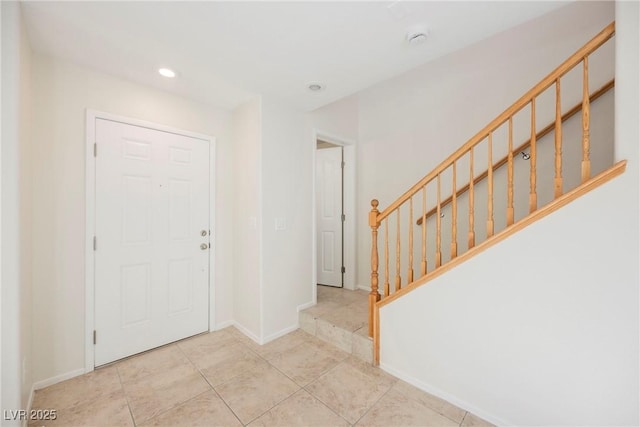 view of tiled foyer entrance