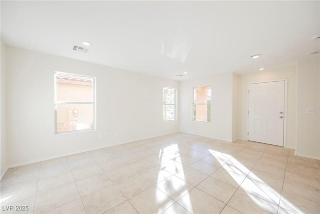 view of tiled spare room