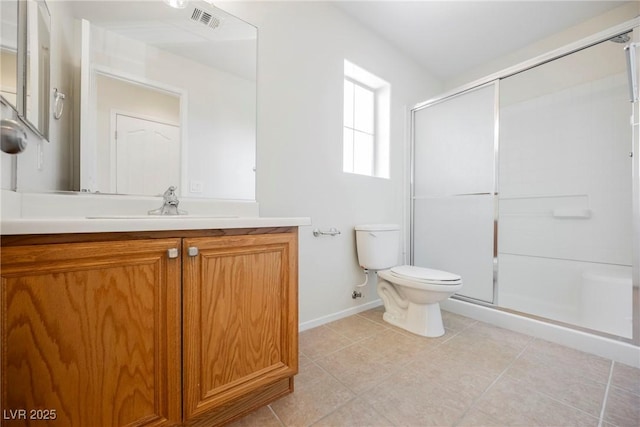 bathroom featuring walk in shower, vanity, and toilet