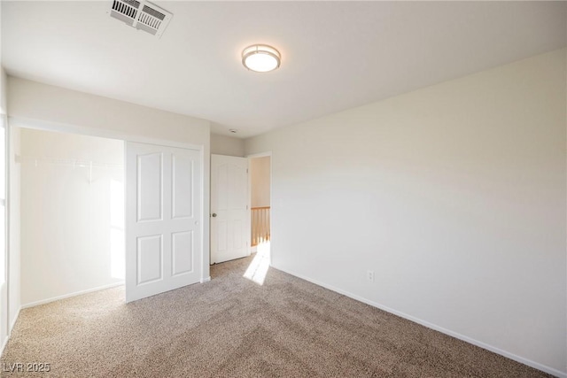 empty room featuring carpet flooring