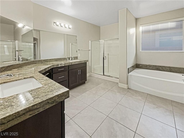 bathroom with vanity, tile patterned flooring, and plus walk in shower