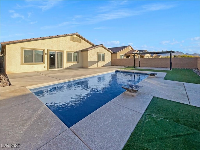 view of pool with a pergola and a patio