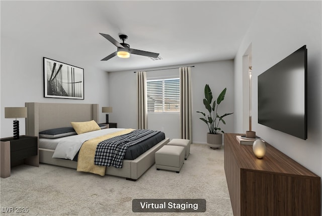 bedroom featuring ceiling fan and light carpet