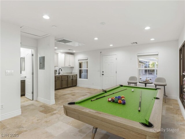 recreation room with billiards, sink, and electric panel