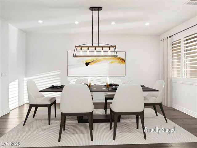 dining area with hardwood / wood-style floors