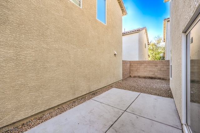 view of home's exterior featuring a patio