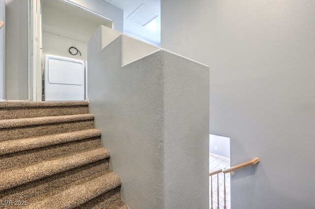 stairway with stacked washer / drying machine