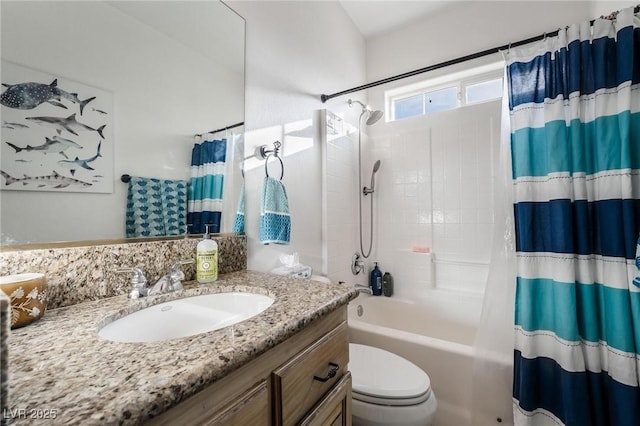 full bathroom with toilet, vanity, and shower / bath combination with curtain