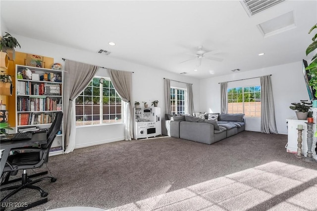 interior space with ceiling fan and a healthy amount of sunlight