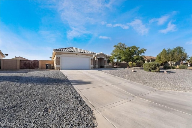 view of front of property with a garage