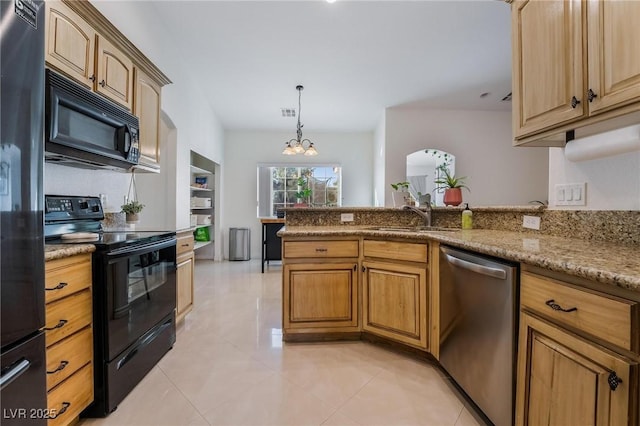 kitchen with light stone countertops, black appliances, sink, a notable chandelier, and light tile patterned flooring