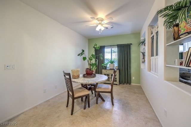 dining area featuring ceiling fan