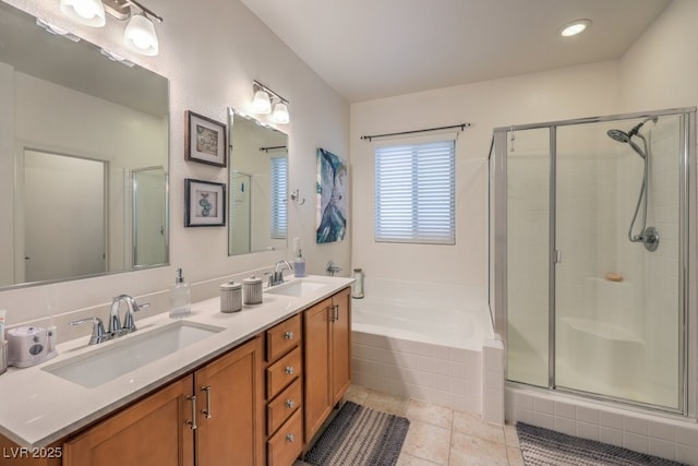 bathroom featuring tile patterned floors, vanity, and plus walk in shower