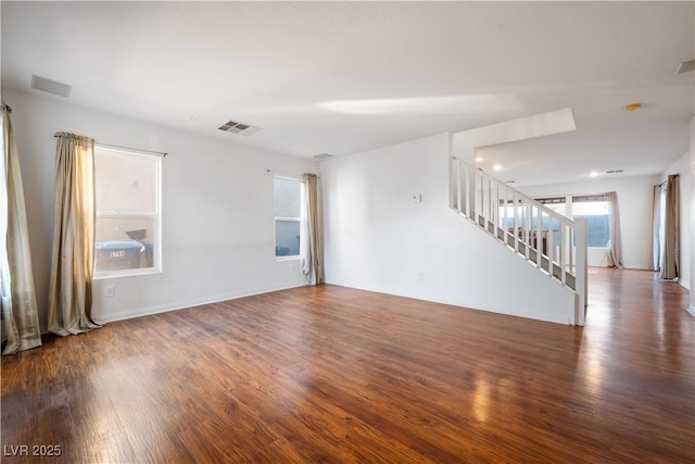 empty room featuring dark hardwood / wood-style floors