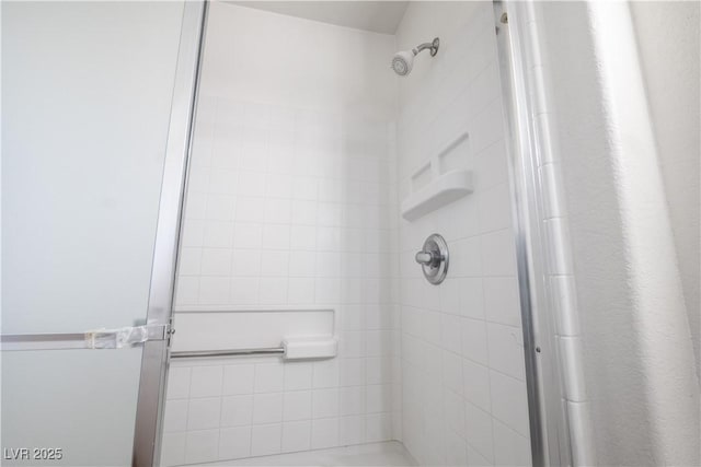 bathroom featuring walk in shower