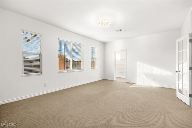 unfurnished room with carpet