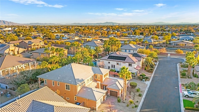 drone / aerial view featuring a mountain view