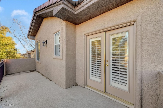 entrance to property with a balcony