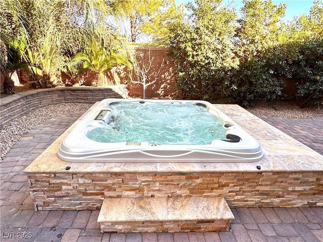 view of pool with an outdoor hot tub and a patio