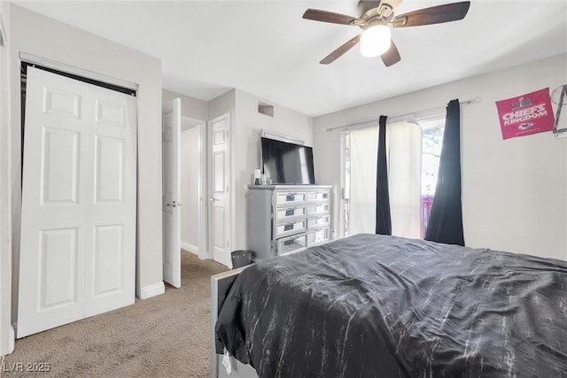 carpeted bedroom with ceiling fan