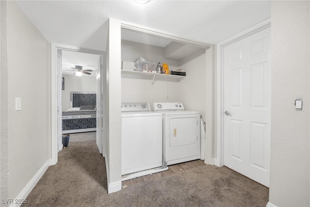 laundry room featuring ceiling fan, washer and dryer, and carpet floors