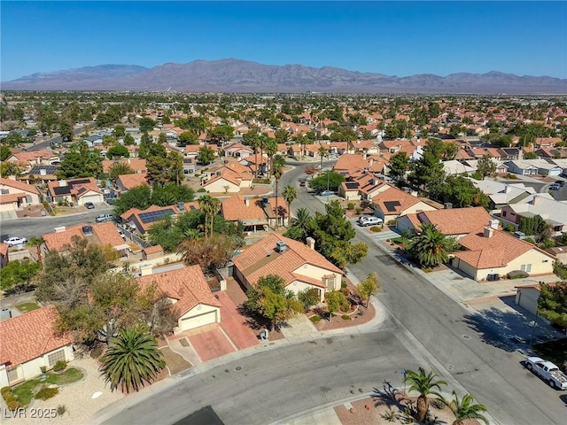 bird's eye view with a mountain view