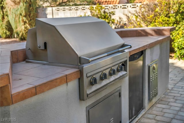 view of patio featuring a grill and area for grilling