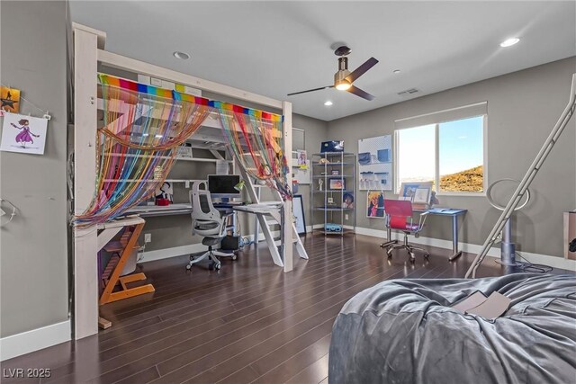 bedroom featuring ceiling fan and dark hardwood / wood-style flooring