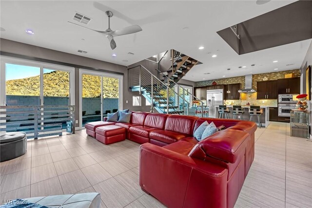 living room with ceiling fan