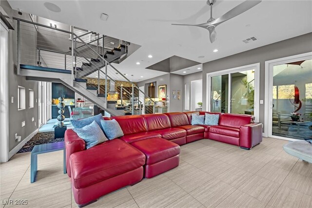 living room featuring ceiling fan