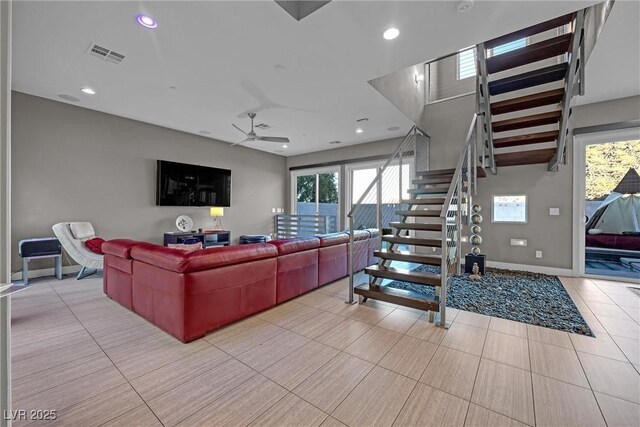 living room with ceiling fan