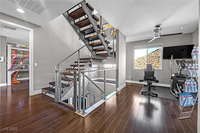 interior space featuring ceiling fan and wood-type flooring