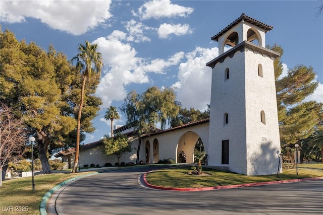 exterior space featuring a front lawn