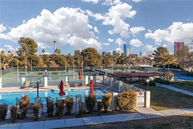 surrounding community with tennis court