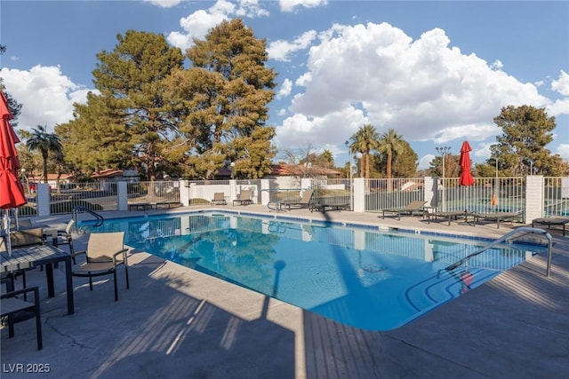 view of swimming pool featuring a patio