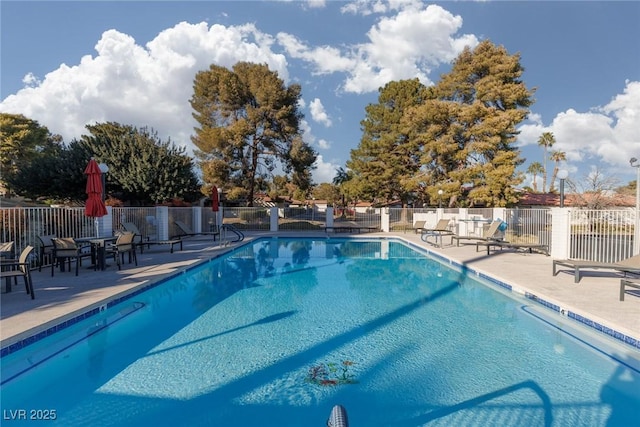 view of pool featuring a patio