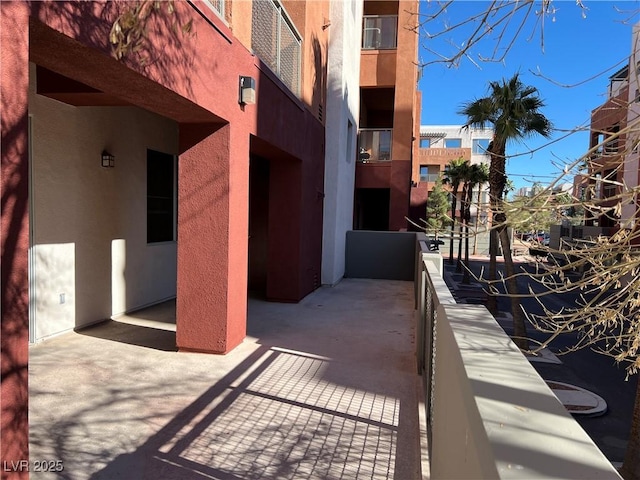 view of patio with a balcony