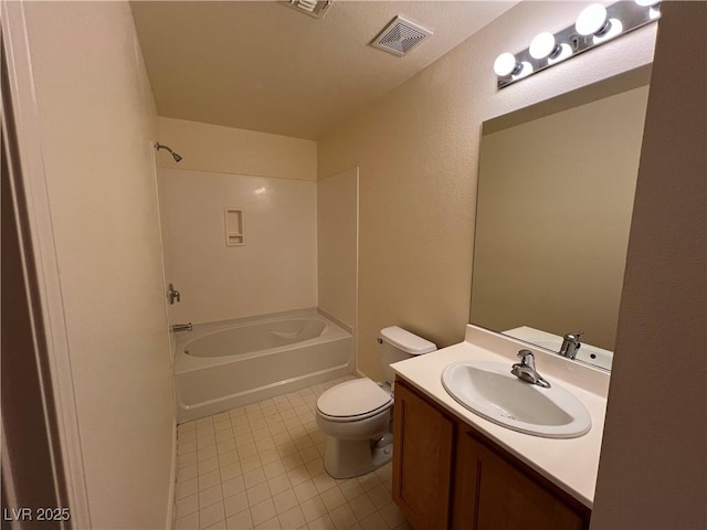 full bathroom with toilet, vanity, tile patterned floors, and shower / bath combination