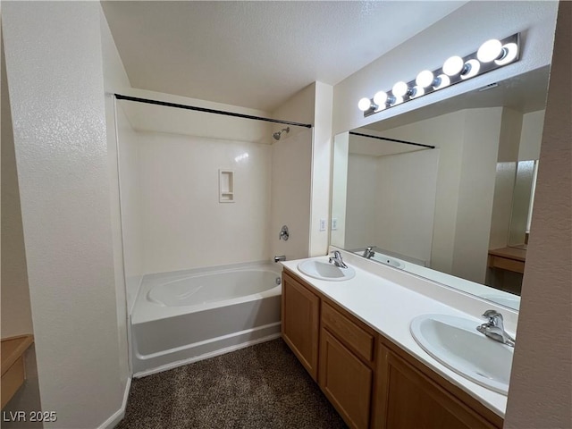 bathroom with shower / tub combination and vanity