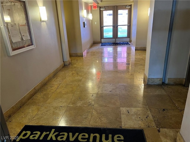 corridor featuring french doors